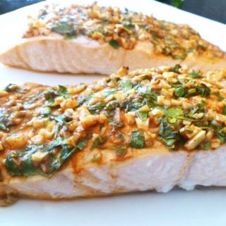 Serve up a quick and easy salmon dinner that is full of flavour! Lemon Herb Crusted Salmon is covered with lemon, garlic, and fresh parsley. This is one tasty baked fish dish.