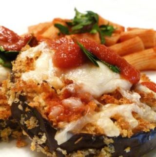 Light and crispy eggplant parmesan, baked to perfection in your oven. Panko Crusted Eggplant Parmesan has all the flavour of the classic dish, but it's baked instead of fried. | easy vegetarian recipes | low carb vegetarian meals | meatless monday recipes | #dinner #healthyfood #food #recipe | thishappymommy.com