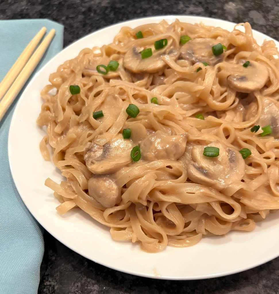 Enjoy the deliciousness of Coconut Peanut Noodles with Mushrooms, a tasty blend of creamy coconut milk, peanut butter, soy sauce, and tender mushrooms. This one pot wonder is not only easy to prepare but it's also filled with comforting flavors.