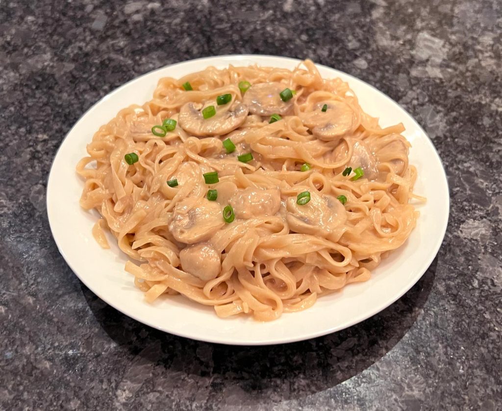 Enjoy the deliciousness of Coconut Peanut Noodles with Mushrooms, a tasty blend of creamy coconut milk, peanut butter, soy sauce, and tender mushrooms. This one pot wonder is not only easy to prepare but it's also filled with comforting flavors.