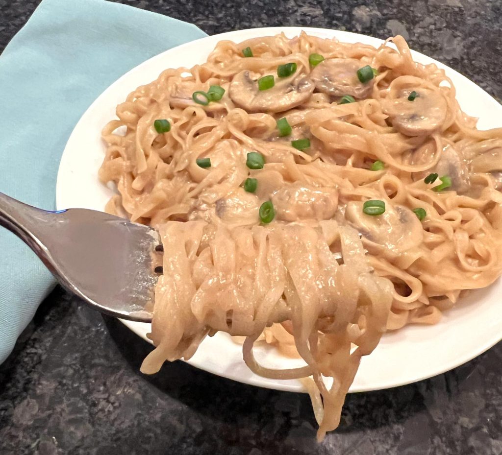 Enjoy the deliciousness of Coconut Peanut Noodles with Mushrooms, a tasty blend of creamy coconut milk, peanut butter, soy sauce, and tender mushrooms. This one pot wonder is not only easy to prepare but it's also filled with comforting flavors.