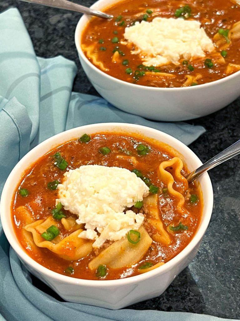 Easy Lasagna Soup brings all the flavors of classic lasagna into a simple, one-pot dinner. Tender noodles, ground beef, a rich tomato broth, and plenty of cheese make this a comforting 30-minute meal. | thishappymommy.com