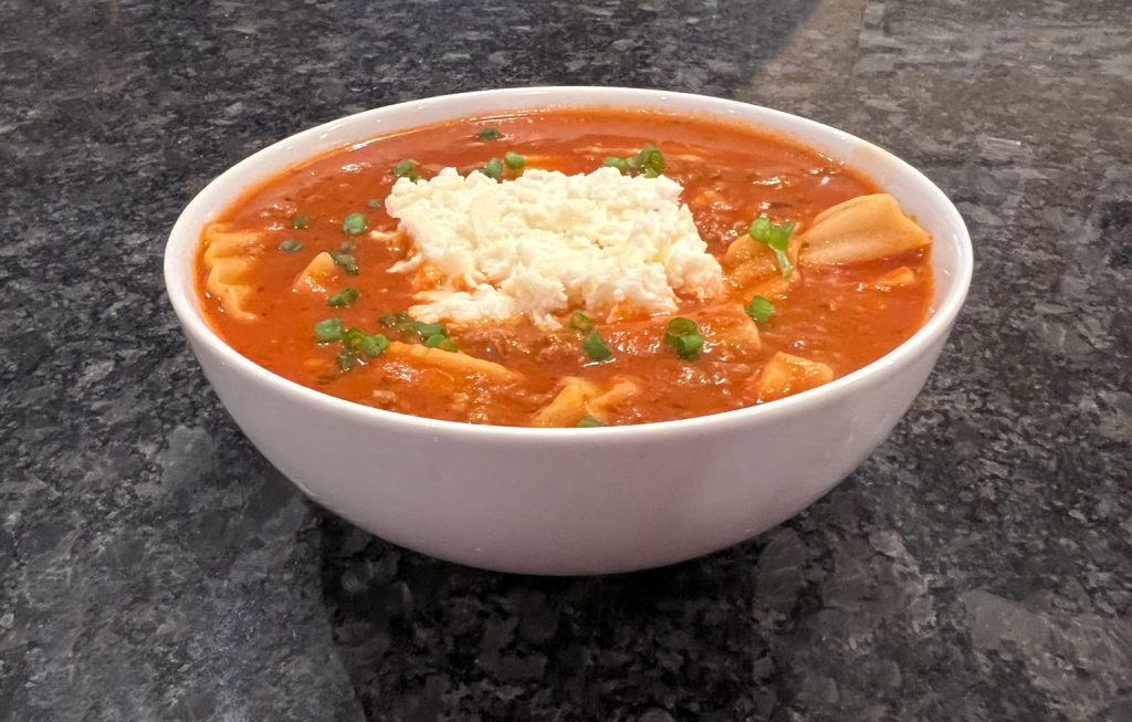 This Easy Lasagna Soup is a one-pot, 30-minute dinner made with ground beef, tender noodles, marinara sauce, and cheese. A filling, family-friendly meal that works perfectly on busy weeknights. | thishappymommy.com